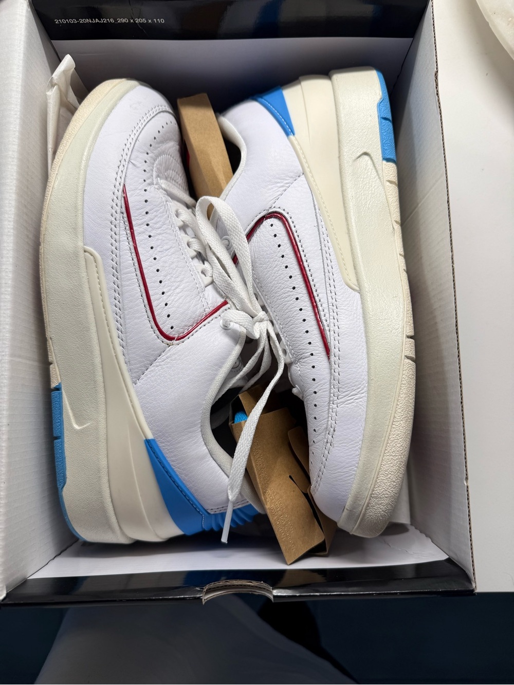 Jordan White Leather Sneakers with Blue and Red Accents